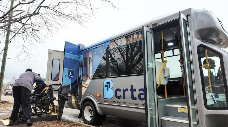 A Butler County Regional Transit Authority bus stops to let off riders in Middletown Wednesday, Dec. 10, 2025. NICK GRAHAM/STAFF