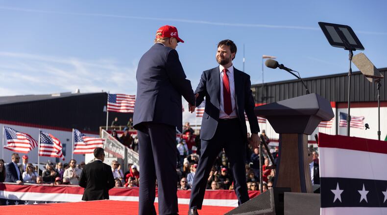 FILE — Sen. JD Vance (R-Ohio) greets former President Donald Trump during a Buckeye Values PAC Rally in Dayton, Ohio on March 16, 2024. Vance, who once feared that Trump would be “America’s Hitler,” is now hoping to run as his vice-presidential candidate. (Maddie McGarvey/The New York Times)