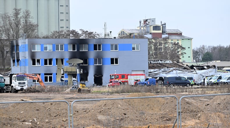 The exterior of the industrial zone where a storage hall burned down is seen in Pardubice, Czech Republic, Friday, March 20, 2026. (Vostarek Josef/CTK via AP)