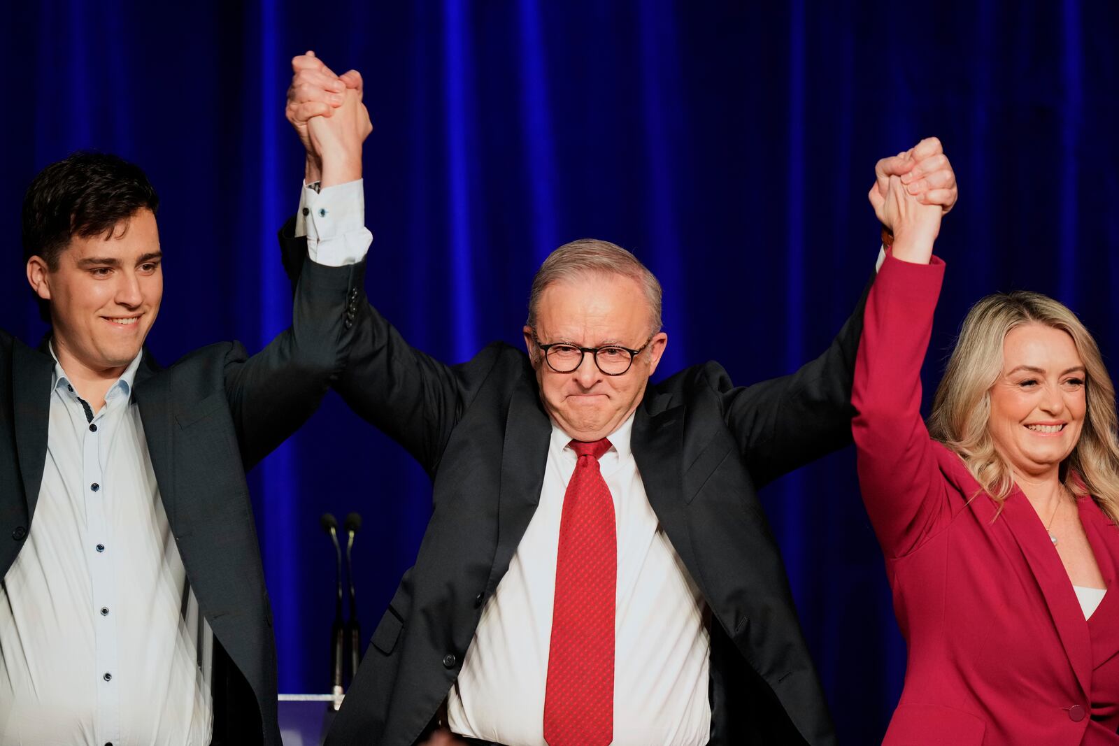 Australian Prime Minister Anthony Albanese, his partner Jodie Haydon and son Nathan react as they meet the party faithful after winning a second term following the general election in Sydney, Saturday, May 3, 2025. (AP Photo/Rick Rycroft)