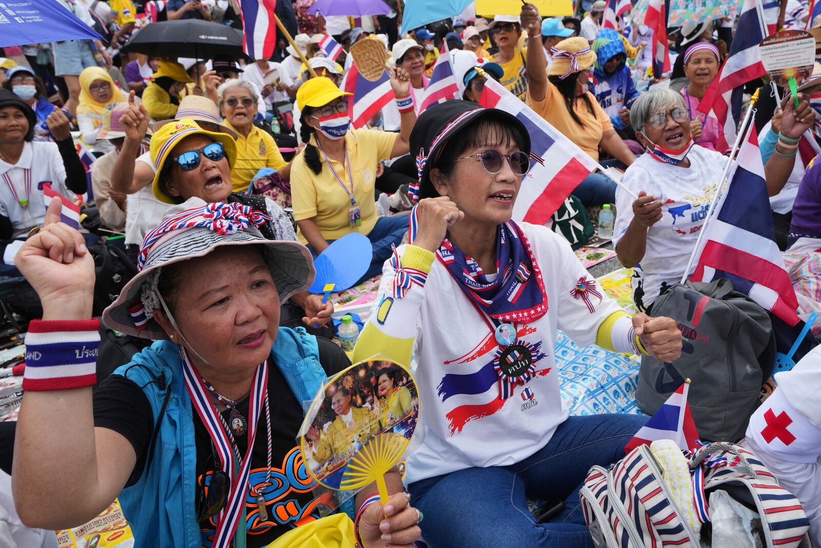 Protesters gather at Victory Monument demanding Thailand's Prime Minister Paetongtarn Shinawatra resign in Bangkok, Thailand, Saturday, June 28, 2025. (AP Photo/Sakchai Lalit)