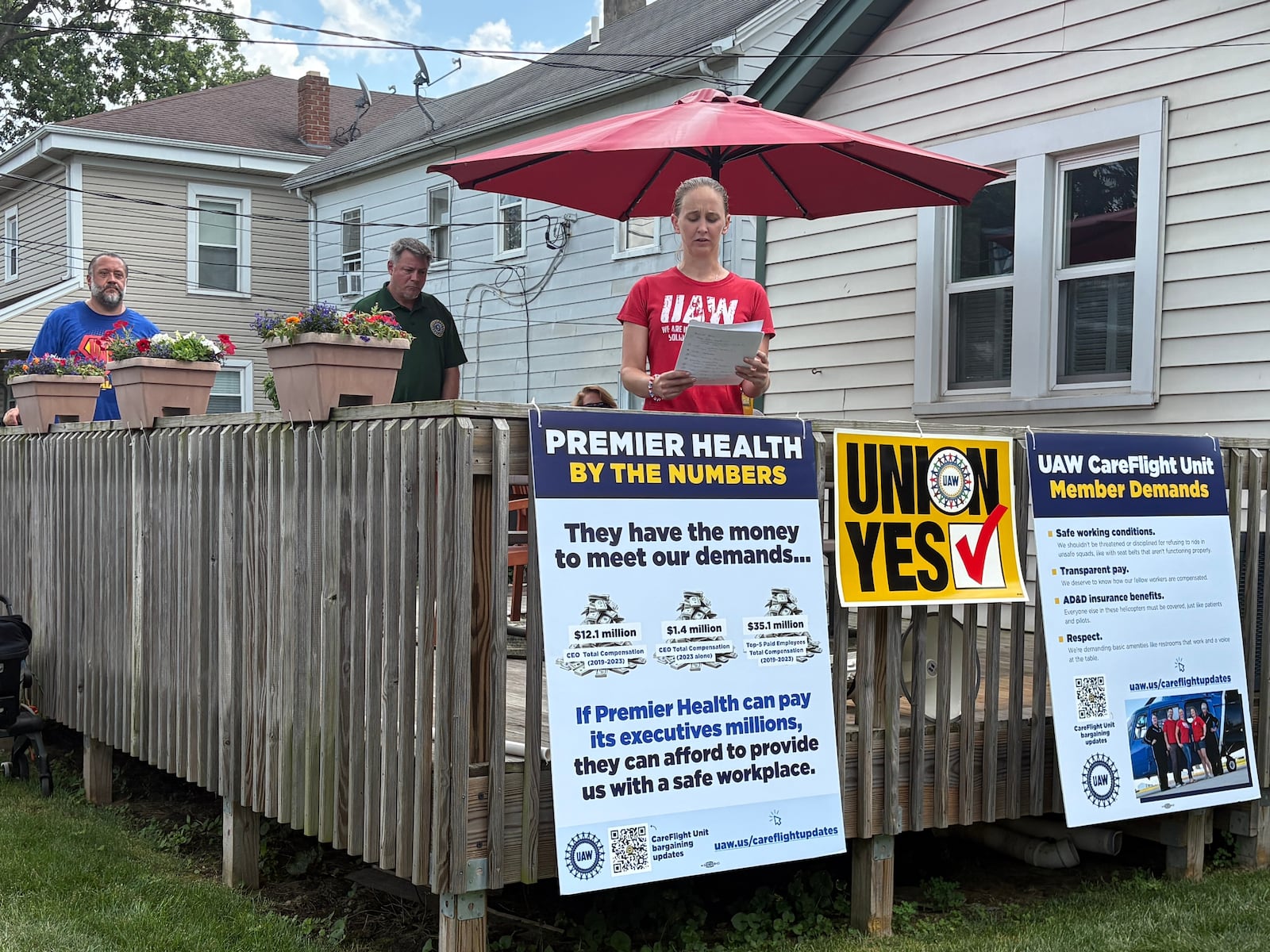 CareFlight flight nurse Nicole Coleman speaks at a rally Friday, June 27, 2025, in support of a contract between the United Auto Workers representing CareFlight nurses and medics and Premier Health. JEN BALDUF/STAFF