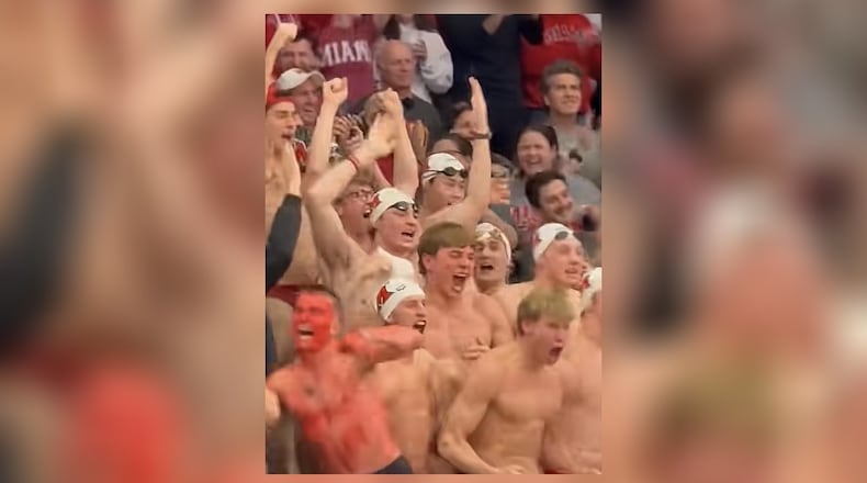 The Miami University's men's swim team is seen in the crowd at the March 18, 2026 First Four basketball team where Miami played SMU, and won. STAFF