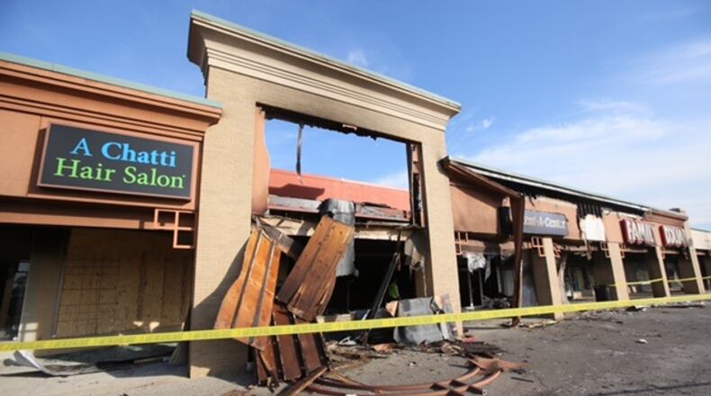 Hamilton Firefighters battled a blaze early Nov. 1 that erupted in the Rent-A-Center on Dixie Highway in the Hamilton Plaza. Flames were shooting out of the storefront when first responders arrived, but they were able to contain the fire before it spread.