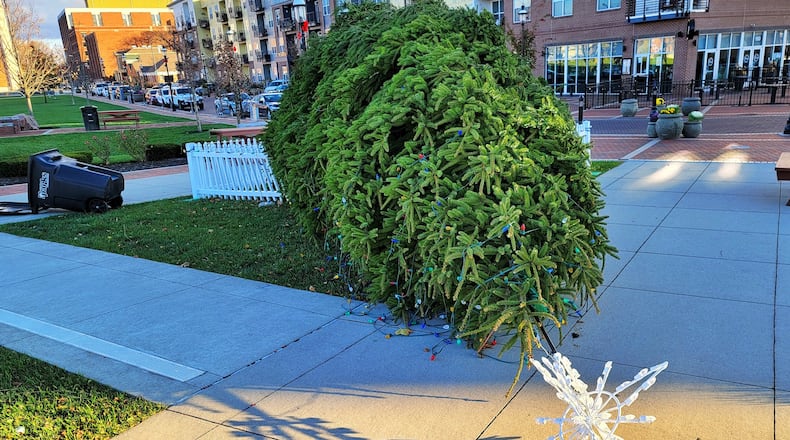 High winds caused issues across Butler County on Sunday, Nov. 15, 2020, including knocking over the recently installed Christmas tree at Marcum Park in Hamilton. NICK GRAHAM/STAFF
