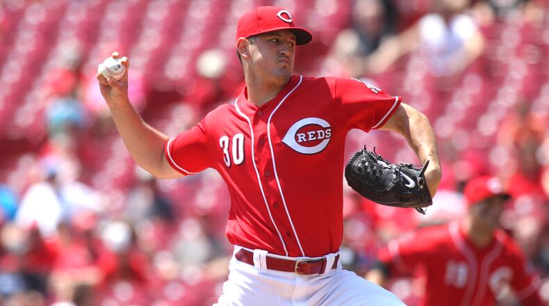 Reds starter Tyler Mahle pitches against the Rockies on Thursday, June 7, 2018, at Great American Ball Park in Cincinnati. The rookie right-hander went 3-0 in June with a 2.18 ERA. David Jablonski/Staff