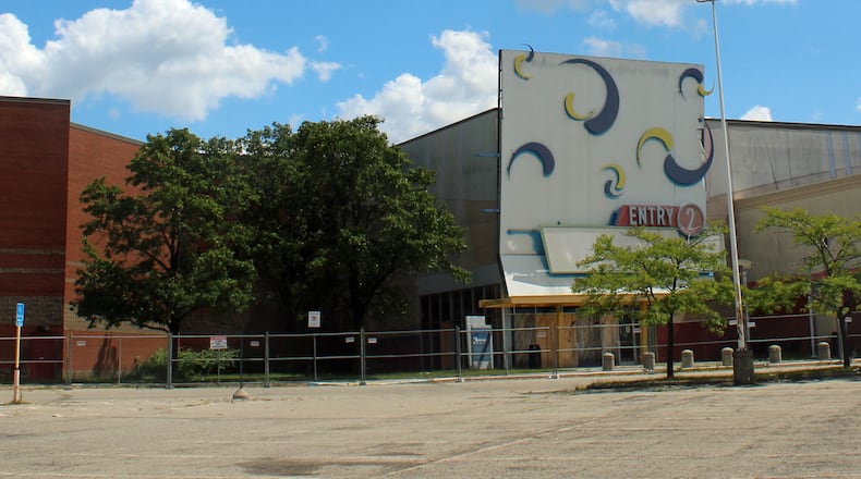 The former Forest Fair Mall and its four-story parking garage will be demolished in two weeks by O’Rourke Wrecking Co. They have erected fencing around the perimeter of the demolition area. SUE KIESEWETTER/CONTRIBUTED