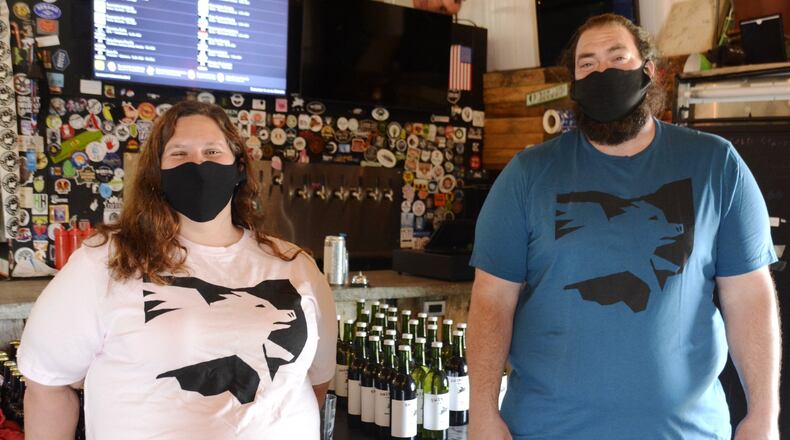 Debby and Dan Ebben, owners of Swine City Brewing, are one of the 36 businesses profiled during Fairfield Mayor Steve Miller’s Mayor’s Tour. MICHAEL D. PITMAN/STAFF