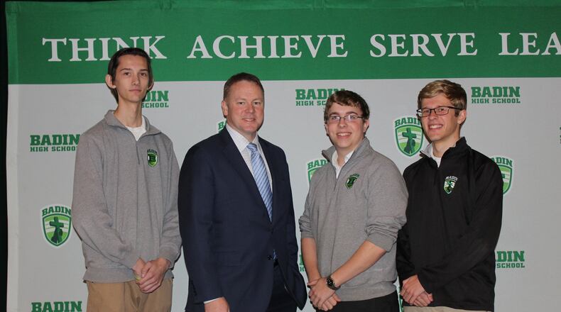 U.S. Rep. Warren Davidson (R-Troy) honored three Badin High School seniors during a technology assembly Dec. 4 at the school. Those recognized by the congressman for winning an 8th Congressional District iPhone app contest were (from left) Nick Eyl, Jon Moran and Jacob Waggoner. CONTRIBUTED