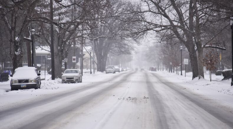 An overnight snow covered roads in Middletown Monday, February 15, 2021 in Middletown. NICK GRAHAM / STAFF