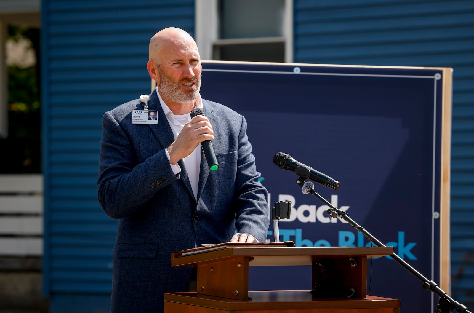 Brett Kirkpatrick, President an CEO of Community First Solutions, speaks during a groundbreaking at the location of the first Build Back the Block home in the city of Hamilton at 936 East Ave. Thursday, Sept. 4, 2025. It's the first of 12 new homes to be built over the next year as part of Phase 1. This first phase represents more than $3 million of new investment into the neighborhood.NICK GRAHAM/STAFF
