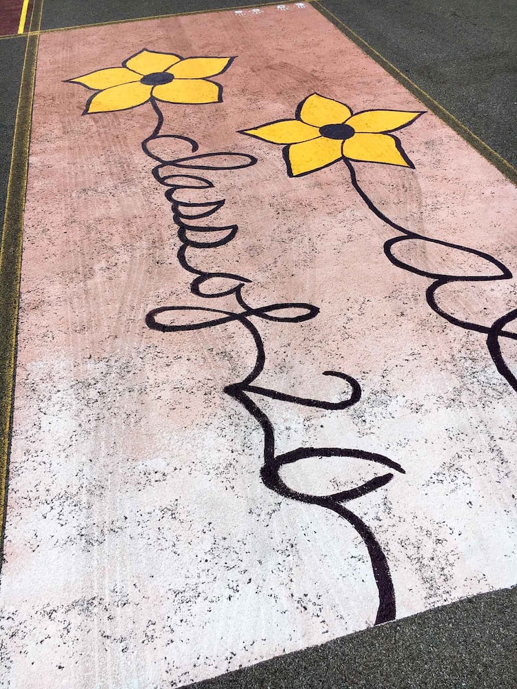 PHOTOS Lakota East seniors paint parking spots