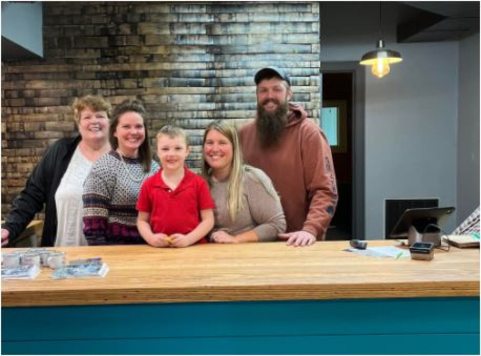 Rustic Home is reopening at a new location on Main Street. Pleased to be back in business after the move are, from left, Lori Noga, Erin Noga, Jackson Schwartz, Jessica Schwartz and Dan Schwartz. PROVIDED
