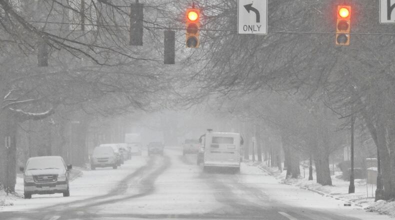 Streets were covered with a wintry mix as freezing temperatures descended upon Middletown on Wednesday, Jan. 30, 2019. NICK GRAHAM / STAFF