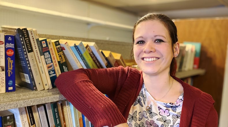 Crystal DeGiuseppe is opening Gypsy Books on Saturday, March 13, 2021, at 1085 Magie Ave. Paperback books are available for $1 and hardback books are available for $2. MICHAEL D. PITMAN/STAFF