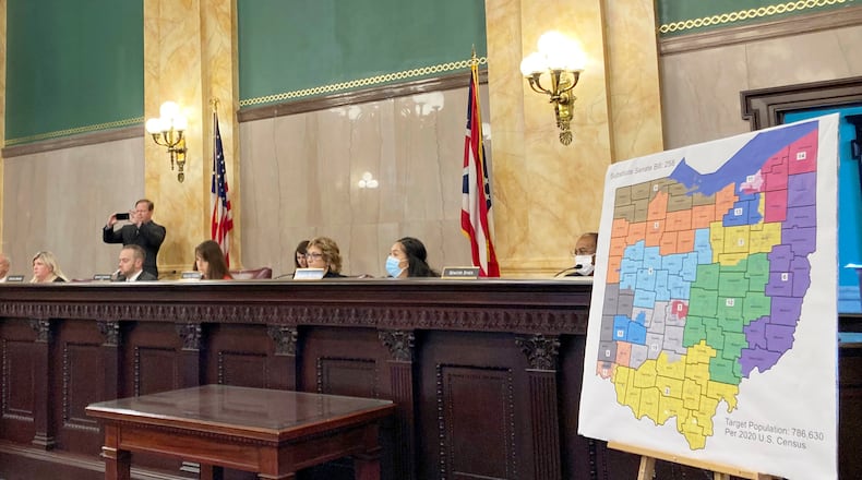 FILE—Members of the Ohio Senate Government Oversight Committee hear testimony on a new map of state congressional districts in this file photo from Nov. 16, 2021, at the Ohio Statehouse in Columbus, Ohio. Democrats bolstered by a high court victory earlier this month appeared to be digging in their heels Saturday, Jan. 22, 2022, against another round of gerrymandered legislative maps in Ohio. The state's bipartisan Ohio Redistricting Commission repeatedly recessed for long stretches ahead of a midnight deadline set by its members to hash out a compromise that satisfies members of both parties.
(AP Photo/Julie Carr Smyth, File)