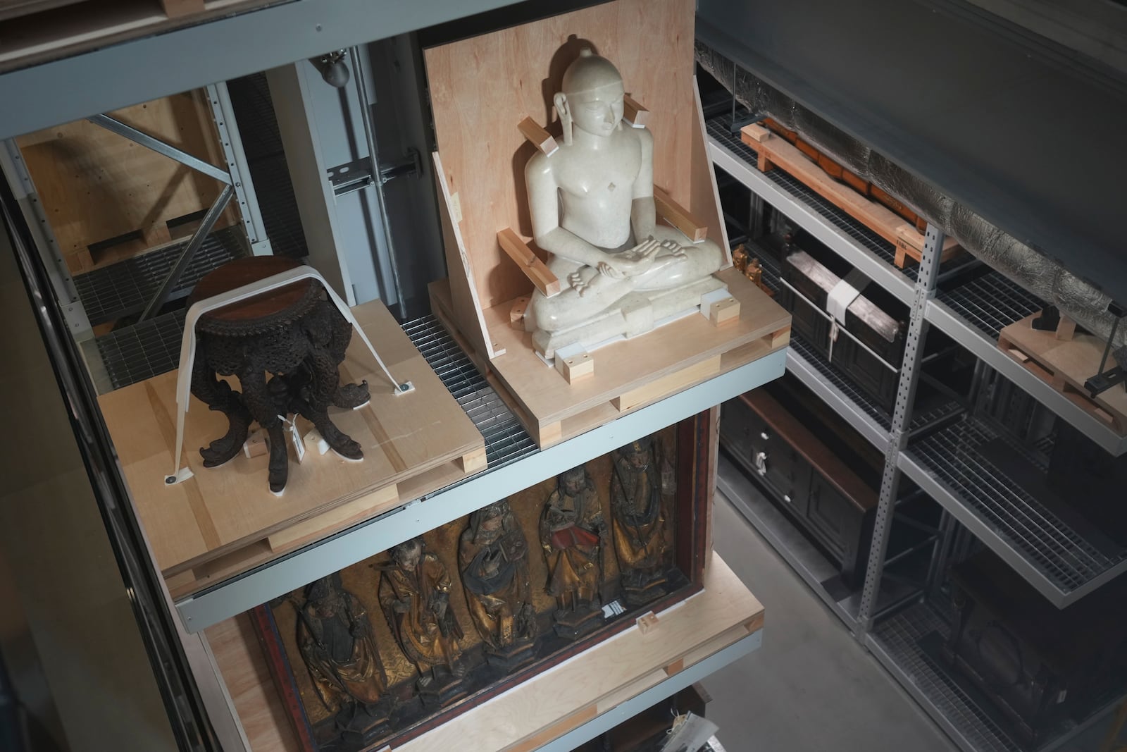 Religious artefacts on display at the V&A Storehouse in London, Thursday, June 5, 2025. (AP Photo/Joanna Chan)