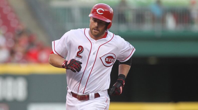The Reds’ Zack Cozart rounds the bases after a home run against the Diamondbacks on Wednesday, July 19, 2017, at Great American Ball Park in Cincinnati. David Jablonski/Staff