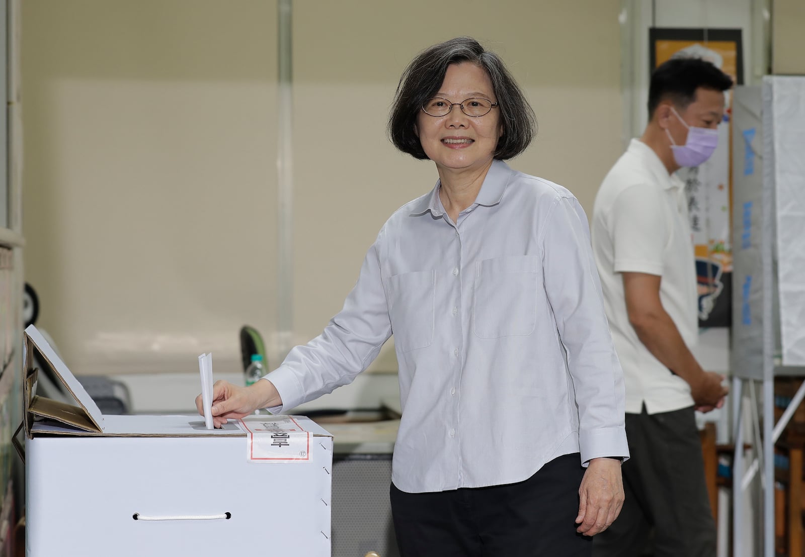 Former Taiwan President Tsai Ing-wen casts her ballot at a polling station in Taipei, Taiwan, Saturday, July 26, 2025 as Taiwanese are casting their votes to determine whether to oust about one-fifth of their lawmakers, all from the opposition Nationalist Party, in elections. (AP Photo/Chiang Ying-ying)