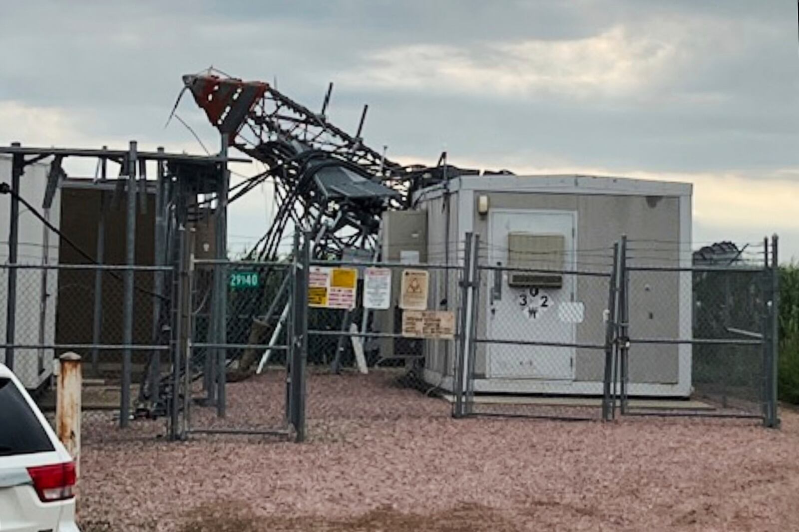 In this image provided by the Lincoln County, S.D., Sheriff's Office, a cell tower sustained damage following strong winds overnight in southern Lincoln County, South Dakota, Tuesday, July 29, 2025. (Sgt. E.J. Colshan/Lincoln County Sheriff's Office via AP)