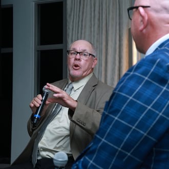 Larry King, left, who began his golf career as a caddie at Brown's Run Country Club, was inducted into the Southern Ohio PGA Hall of Fame Friday night at Scioto Reserve Country Club in Columbus. PGA member Pat Bernot emceed part of the ceremony. RON ALFREY/CONTRIBUTOR