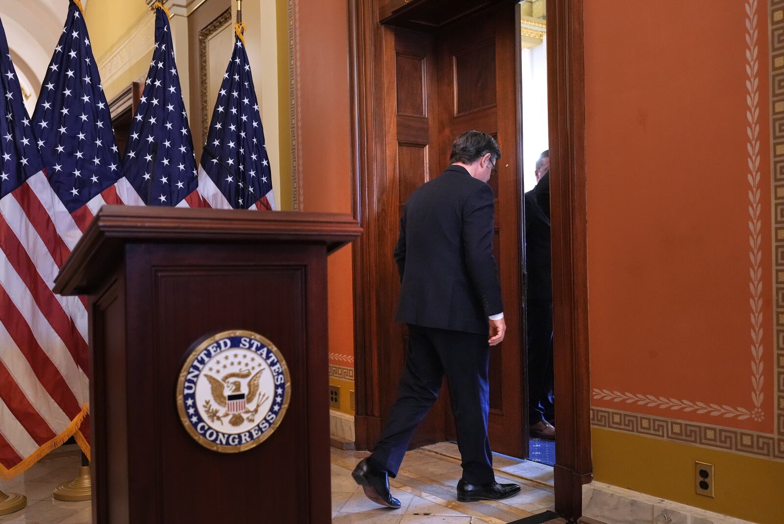 Speaker of the House Mike Johnson, R-La., departs after he and Senate Majority Leader John Thune, R-S.D., made statements to reporters ahead of a vote in the House to pass a bill on President Donald Trump's top domestic priorities of spending reductions and tax breaks, at the Capitol in Washington, Thursday, April 10, 2025. (AP Photo/J. Scott Applewhite)