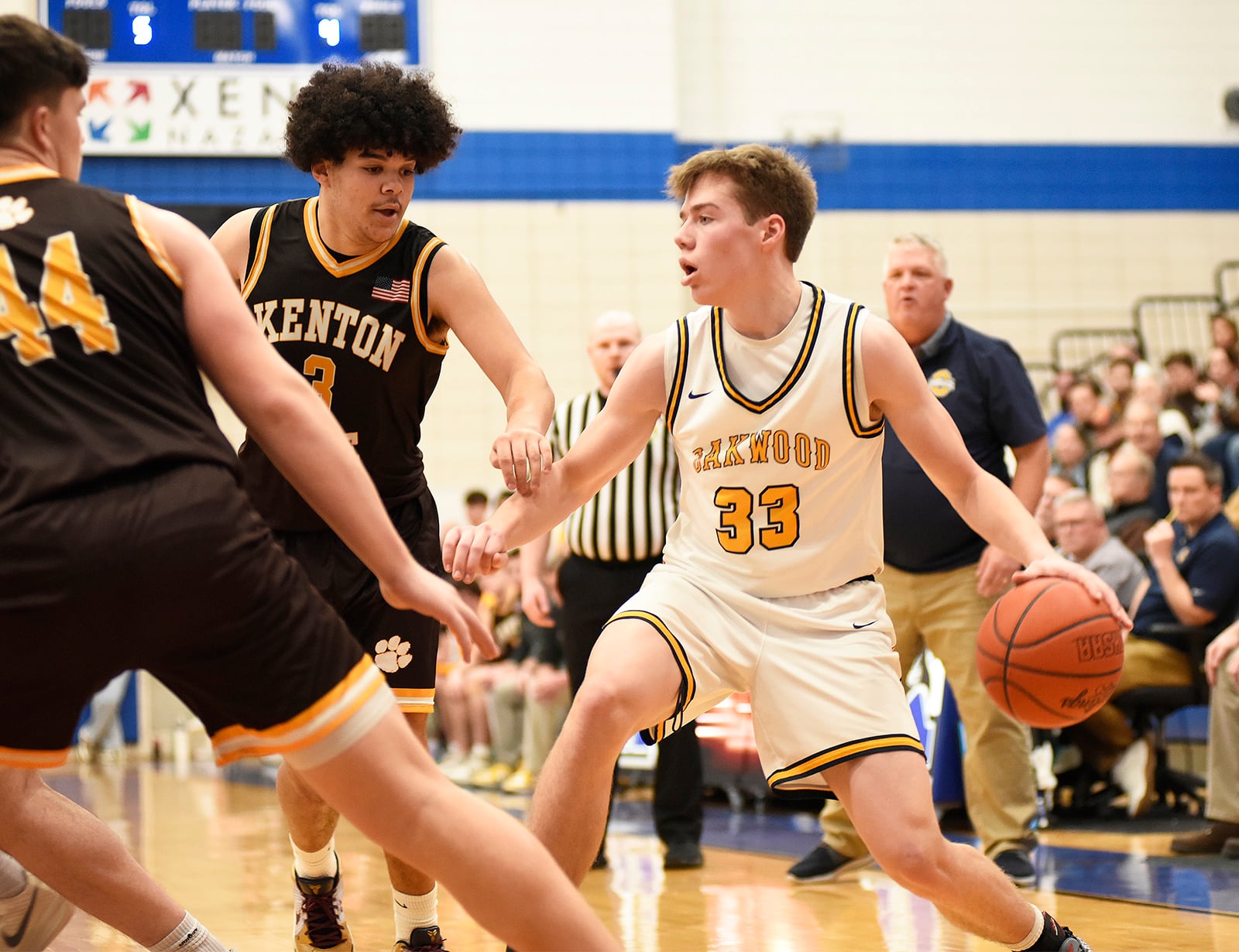 Oakwood freshman Drew Woeste dribbles the ball during their Division IV second round game against Kenton Ridge on Saturday, Feb. 28, 2026 at Xenia High School. The Lumberjacks won 75-68. GEOFF NEVILLE / CONTRIBUTING WRITER