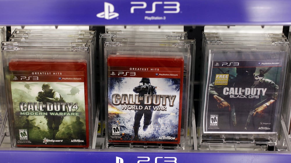 FILE - Three versions of Activision's Call Of Duty games are seen on sale at Best Buy, in Mountain View, Calif., Wednesday, Aug. 3, 2011. (AP Photo/Paul Sakuma, File)