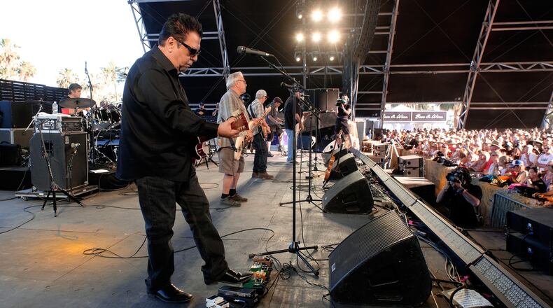 (L-R) Musicians Enrique Gonzalez, Cesar Rosas, Conrad Lozano, Louie Perez, Steve Berlin, and David Hidalgo of Los Lobos perform at 2017 Stagecoach California's Country Music Festival. The band will be playing this summer with Emmylou Harris at the Rose Music Center in Dayton and the ICON Music Center in Cincinnati. (Photo by Frazer Harrison/Getty Images for Stagecoach)