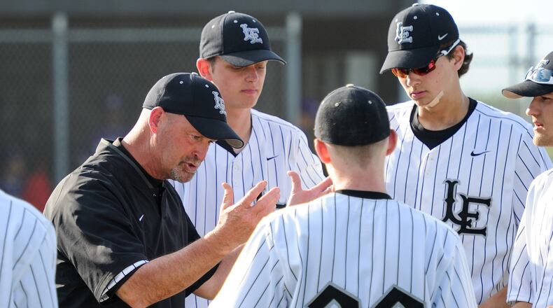 Lakota East coach Ray Hamilton instructs his players between innings of a game against Middletown on April 20, 2016. Host East won 6-4. NICK GRAHAM/STAFF