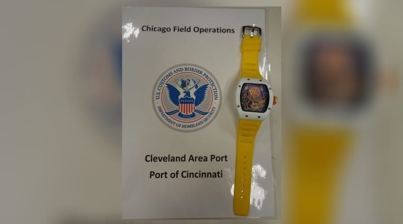A replica of a Richard Mille 88 Automatic Winding Tourbillon Smiley watch, of which the real one is valued in the millions, was recently seized by U.S. Customs and Border Patrol officers in Cincinnati. it had been shipped to the U.S. from India and was headed to Palm Beach, Fla. CONTRIBUTED