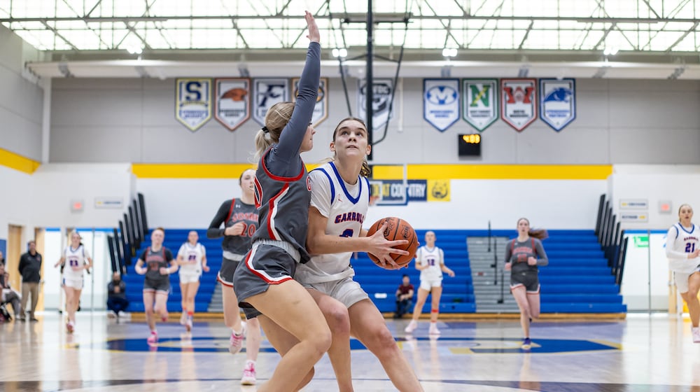 Carroll beat Goshen and Bellbrook beat Monroe to win Division III district titles on Saturday, Feb. 28, 2026 at Springfield High School. MICHAEL COOPER / STAFF