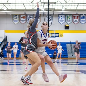 Carroll beat Goshen and Bellbrook beat Monroe to win Division III district titles on Saturday, Feb. 28, 2026 at Springfield High School. MICHAEL COOPER / STAFF