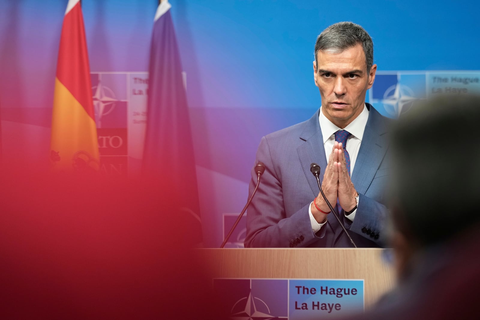 Spain's Prime Minister Pedro Sanchez gestures during a press conference after the plenary session at the NATO summit in The Hague, Netherlands, Wednesday, June 25, 2025. (AP Photo/Markus Schreiber)