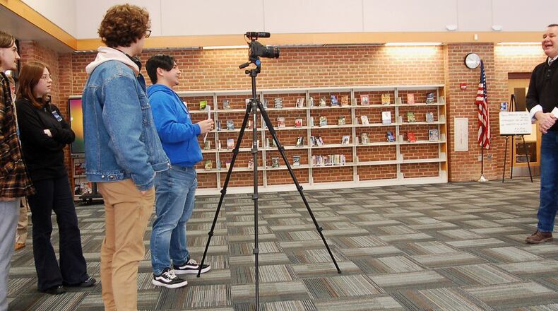 A growing and popular media production class at Hamilton High School is now celebrating a decade of success. The BluTV program, which borrows from the high school’s Big Blue nickname, is helping teens explore at an early age possible careers in media production while learning the latest in digital skills useful for many other professions. Shown are BluTV students producing a video interview with Hamilton’s Fitton Center for the Creative Arts Ian MacKenzie-Thurley. CONTRIBUTED