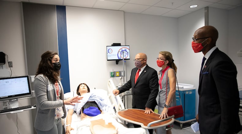 Miami University officials took their first tour Friday of a $10 million renovation of a nurse learning and training facility on the school's Hamilton regional campus. From left to right: Miami Nursing Simulation Coordinator Abby Richardson, Miami President Gregory Crawford, University Ambassador Renate Crawford, and Vice President & Dean of College of Liberal Arts and Applied Science Ande Durojaiye. (Provided Photo\Journal-News)