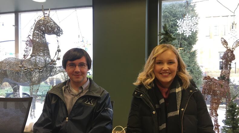Tyler Cook, 22, of the Dayton area (LEFT), and Brooke Wells, a Hamilton native, are working this year with the Love Your Block program to make areas of Hamilton more visually appealing. MIKE RUTLEDGE/STAFF