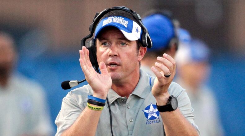 Hamilton football coach Chad Murphy celebrates a touchdown during a game against Milford at Virgil Schwarm Stadium in Hamilton on Aug. 30, 2013. JOURNAL-NEWS FILE PHOTO