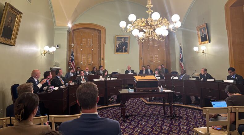 The Ohio House Ways and Means Committee debates amendments to a measure that will give property taxpayers relief in the face of enormous property value hikes. AVERY KREEMER/STAFF