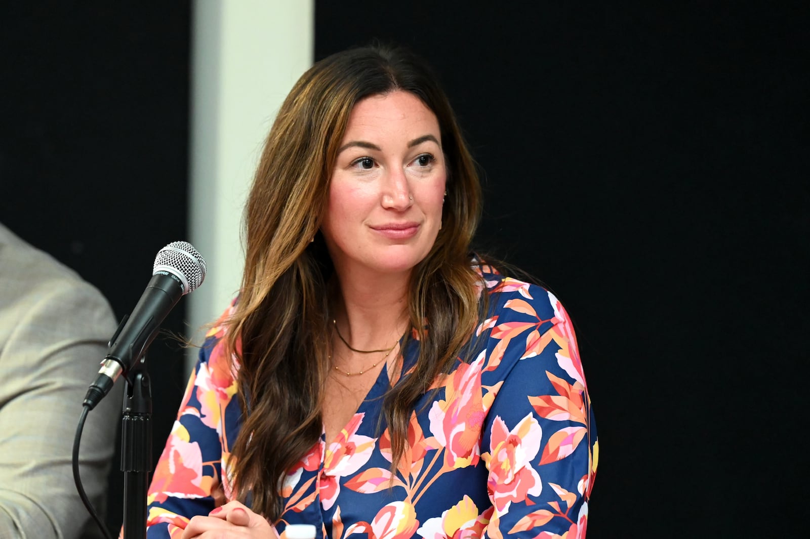 Five people are seeking three open seats on Hamilton City Council in the Nov. 4, 2025, general election. Pictured is Lauren Copas Smallwood listening to a question being asked during a Sept. 24, 2025, candidates' forum hosted by the Greater Chamber of Commerce at Miami Downtown Hamilton Center on High Street. MICHAEL D. PITMAN/STAFF