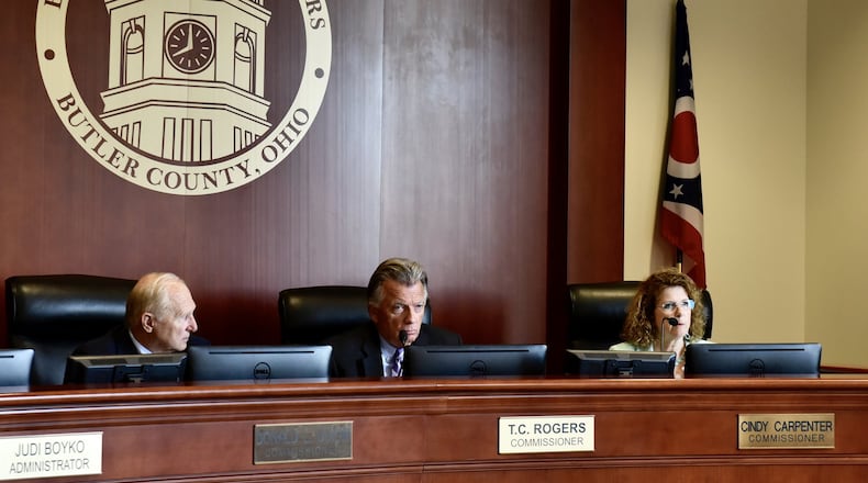 State Rep. Candice Keller implored the Butler County commissioners to declare all businesses essential and reopen the county economy. The county prosecutor informed the commissioners they do not have the authority. Butler County Sheriff s Office Chief Deputy Anthony Dwyer speaks to Butler County Commissioners about the Sheriff s Office possibly taking over the Butler County Emergency Management Agency during a Commission meeting Monday, July 15 in Hamilton. NICK GRAHAM/STAFF