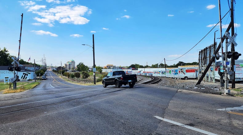 The Ohio Department of Transportation plans to improve the railroad crossing and intersection at Ohio 4 and Maple Avenue. This will includes improving signalization and pre-emption devises, and removing two legs of the pedestrian crosswalk and relocating them west on Maple. The $1 million project could begin as early as May 2025, but the completion deadline is Nov. 1, 2025, according to ODOT. Pictured is the Norfolk Southern railroad crossing on Maple Avenue at Ohio 4 on Monday, Sept. 16, 2024. NICK GRAHAM/STAFF