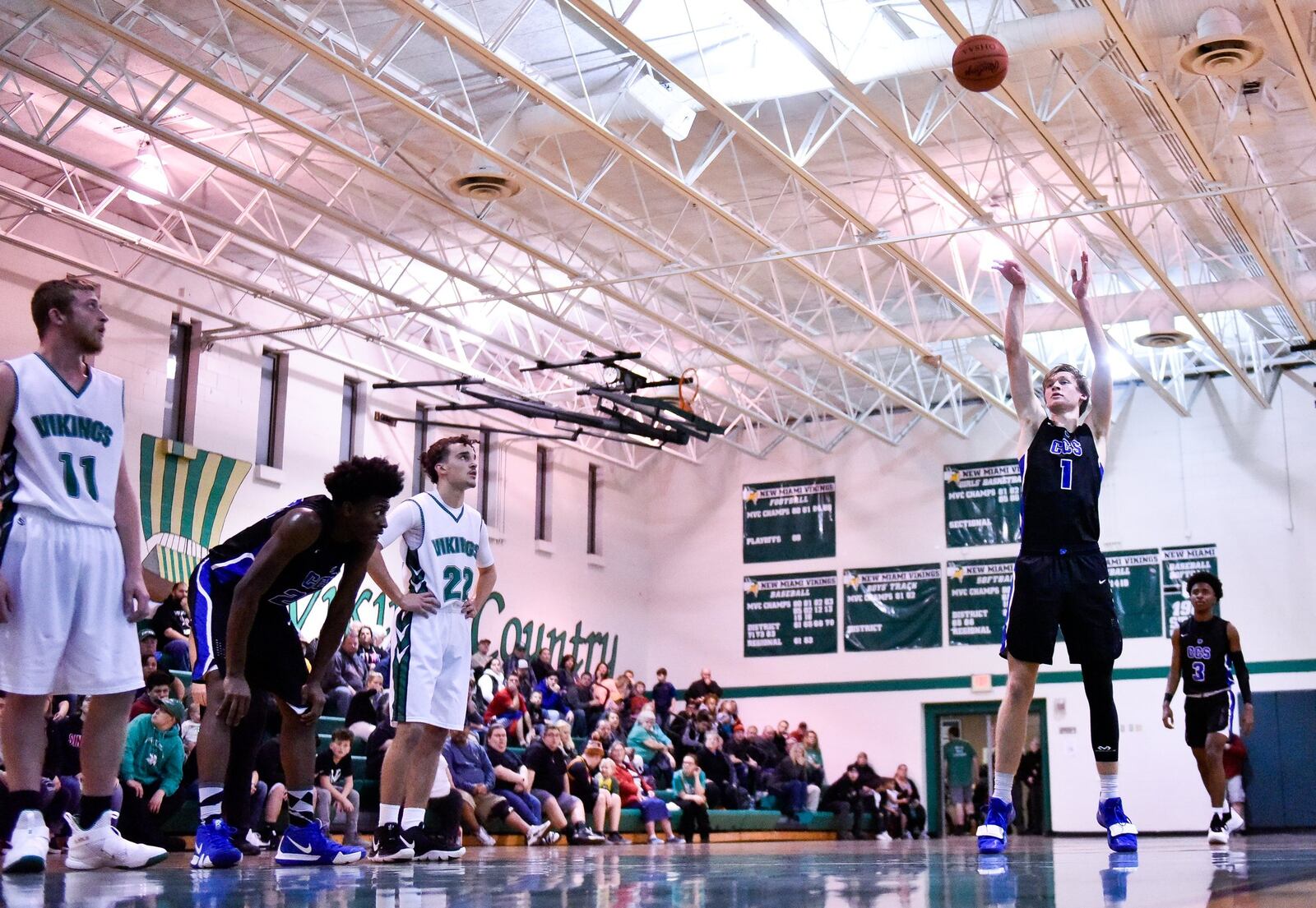 Cincinnati Christian’s Riley Reutener shoots a free throw during Friday night’s 70-52 victory at New Miami. NICK GRAHAM/STAFF