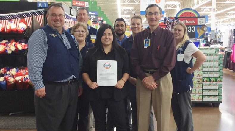Michelle Johnson (center), of Fairfield, was selected by Walmart to participate in its June 28 Open Call event at company headquarters in Bentonville, Ark. If selected, the products offered by Johnson’s wholesale business could end up in anywhere from one to 4,600 Walmart stores.