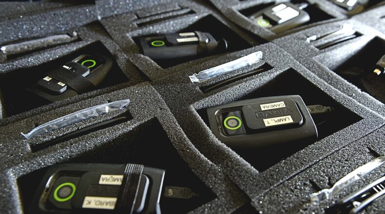 The Miami University Police Department was the first Butler County police department whose officers wore body mounted cameras. NICK GRAHAM / STAFF