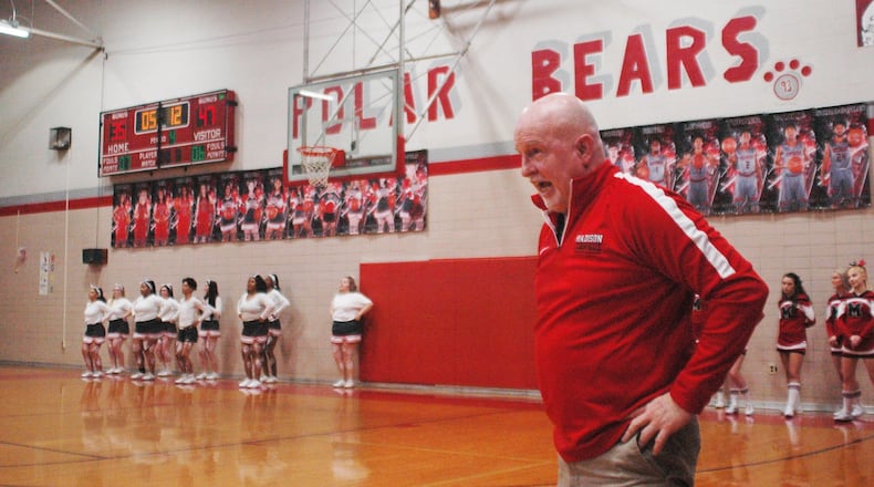 Madison coach Jeff Smith reacts to a play during Saturday night’s game against Northridge in Harrison Township. Madison won 62-51. RICK CASSANO/STAFF