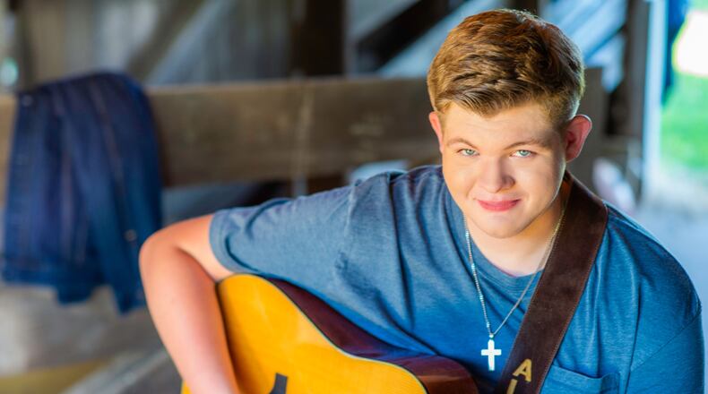 Singer/songwriter Alex Miller performs at Keepin' It Country Farm on Saturday, July 17. CONTRIBUTED