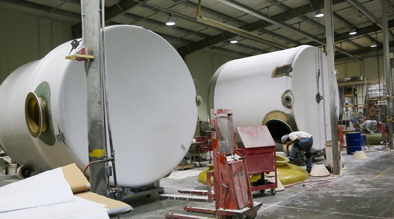 Plas-Tanks Industries, which provides solutions to material storage or processing problems through the effective fabrication of reinforced plastic products. GREG LYNCH / STAFF