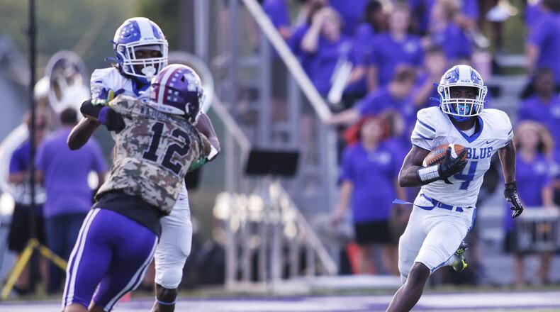 Hamilton’s Jaylan Garrett carries the ball during their football game against Middletown Friday, Sept. 2, 2022 at Barnitz Stadium in Middletown. Hamilton won 17-0. NICK GRAHAM/STAFF