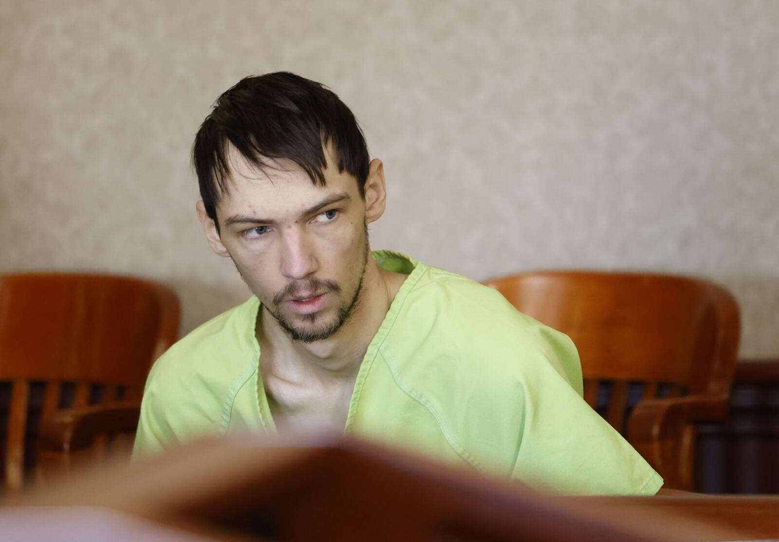 Austin Combs, accused of shooting his neighbor in Okeana, appeared for a hearing in Butler County Common Pleas Court Monday, Nov. 21, 2022 in Hamilton. NICK GRAHAM/STAFF